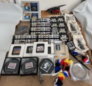 A collection of Royal Mail leaf figures together with post office and stamp paperweights,