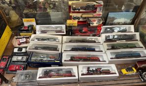 A collection of model cars, trains etc including Lledo, Gilbow,