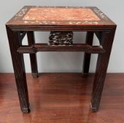 A Chinese hardwood occasional table inset with a marble panel and mother of pearl,