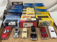 A collection of Vanguard model cars and other models