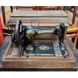 A Singer sewing machine in a case
