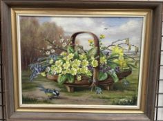 Constance Cooper A basket wild flowers and a blue tit Oil on canvas Signed 30 x 40cm