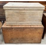 A bleached pine coffer of rectangular form together with another larger pine coffer