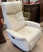 A Sitbest electric reclining swivel chair in cream leather (sold as seen,