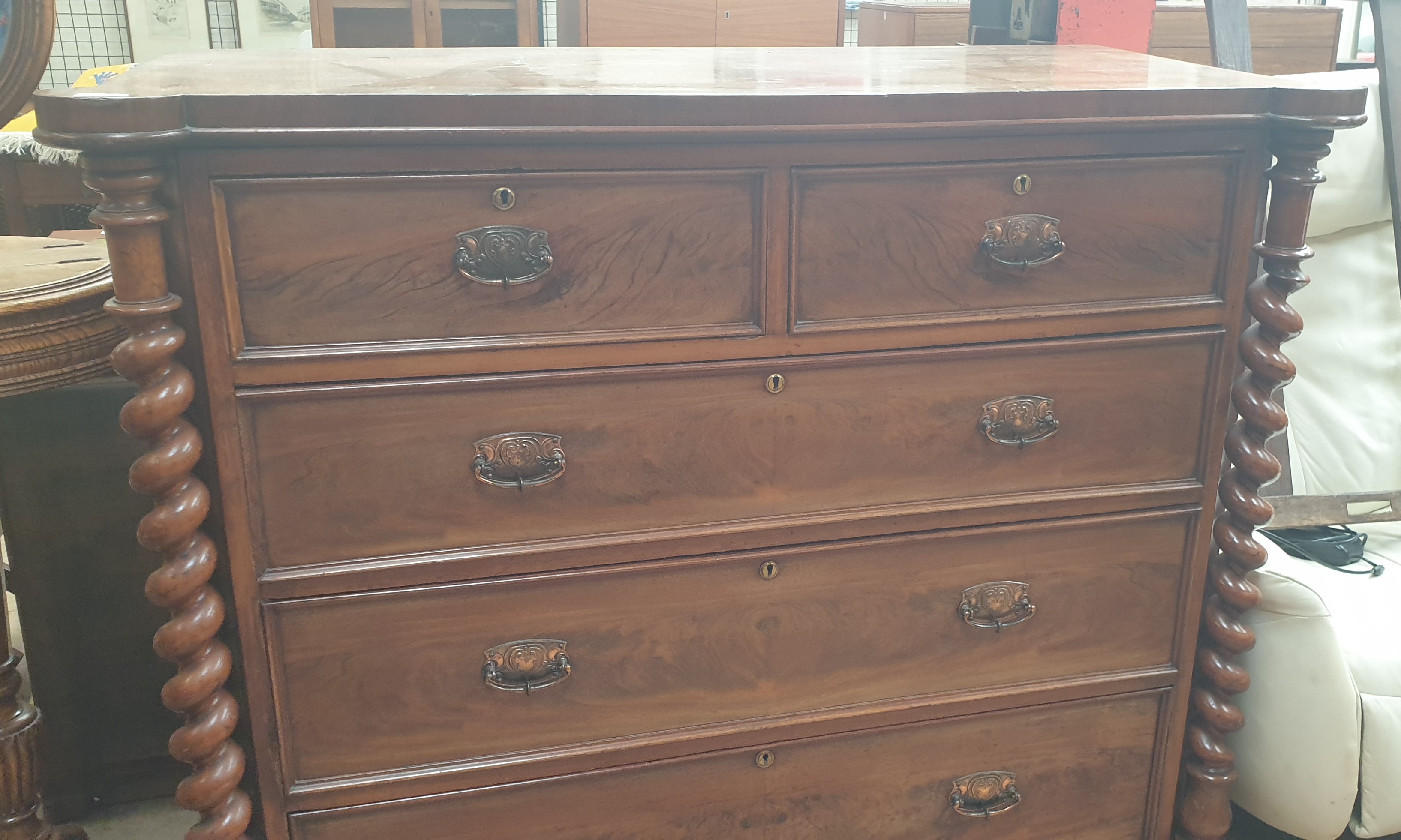 A Victorian mahogany chest with two short and three long drawers enclosed between rope twist - Image 2 of 2