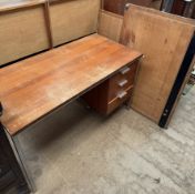 A mid 20th century teak desk together with two draughtsman board