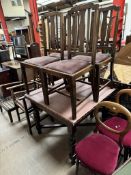 An oak dining suite comprising an extending dining table,