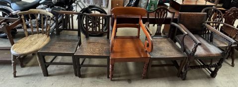 A leather upholstered elbow chair together with two other elbow chairs a pair of dining chairs and