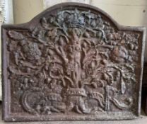 A cast iron fire back in the 17th Century style with a Royal oak design with a crown and the