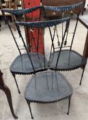 A set of three chairs attributed to Tomaso Buzzi, with draped top rail arrow and wire twist back,