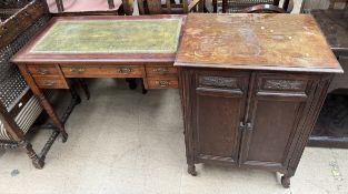 An Edwardian leather inset writing desk with five drawers on turned legs together with an oak side