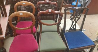 A pair of Victorian mahogany balloon back bedroom chairs together with a pair of Victorian mahogany