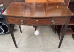 A 19th century mahogany side table with a D shaped top and a frieze drawer on square tapering legs