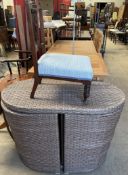 A compact garden table and two chairs together with a nursing chair