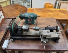 A J F Stringer & Co Ltd electric lathe with a Bosch PSM 125 motor (sold as seen,