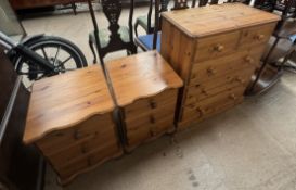 A pine chest of drawers together with a pair of pine bedside cabinets