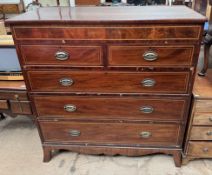 A 19th century mahogany chest with two short and three long drawers on splayed bracket feet