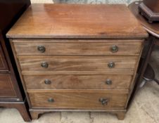 A 19th century mahogany chest with four long drawers on bracket feet
