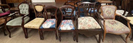A George III mahogany commode elbow chair together with a pair of Victorian dining chairs,