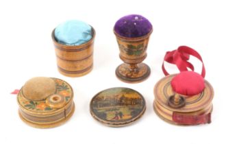Five whitewood Tunbridge ware pin cushions, comprising, two circular examples incorporating tape