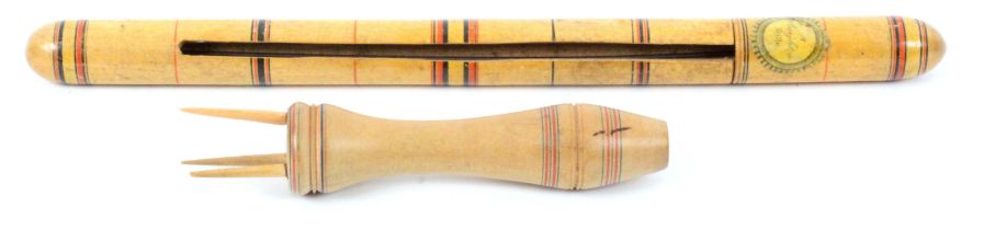 A whitewood paint decorated knitting Nancy and a cylinder knitting needle case, the first with three