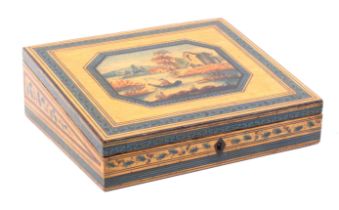 A whitewood paint decorated Tunbridge ware writing box, the slant top painted with a man in a boat