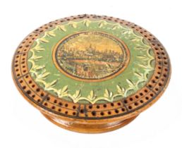 An unusual whitewood print and paint decorated Tunbridge ware circular cribbage board, the domed top