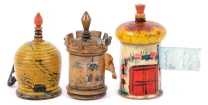 Three whitewood paint decorated Tunbridge ware tape measures, comprising a turret form example,