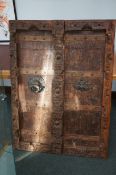 Solid wood double doors, age unknown. Total width