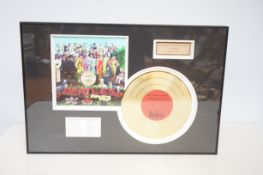 Framed Beatles gold disc St Pepper