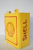 Yellow shell petrol can