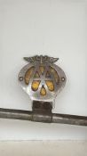 Vintage AA and RAC car grille badge bar with mounted badges from the early to mid-20th century,