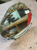 Oval ornate mirror