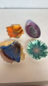 Set of four vintage Shelley pottery shell-shaped dishes, each hand-painted in vibrant glazes.