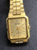 Gents gold plated Bill Blass quartz watch with dia