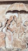 Hand-carved African relief panel depicting a royal procession, crafted from textured wood, featuring
