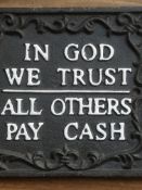 In God We Trust cast iron sign