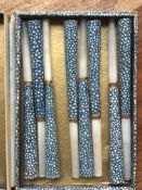 Box of oriental cheroot holders