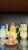 Vintage Shelley drip glaze pottery collection, including vases, coffee pot, and chamberstick.