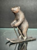 Carved Black Forrest bear on skies