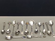 Collection of white metal souvenir spoons