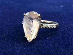 9ct Gold ring set with diamonds & large pink stone
