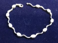 Silver bracelet set with 9 white stones Weight 6.7