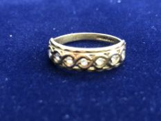 9ct Gold ring set with 7 white stone Weight 3.1g S