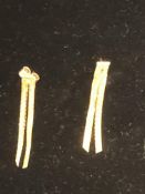 Yellow metal earrings possible 18ct gold - no hall