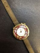 Vintage Swiss A M pocket watch on a vintage rolled