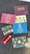Collection of British & Commonwealth coin sets, 1960sâ€“1970s (approx. 15)