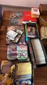 Assorted PokÃ©mon TCG cards, tins and promos