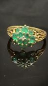 9ct Gold ring set with emerald cluster with centra