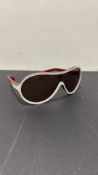 Nike “Vintage 75” EV0600 wrap-around sunglasses, red and white plastic frame with tinted brown